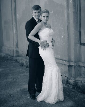 emotional groom and bride posing for the cameraの写真素材