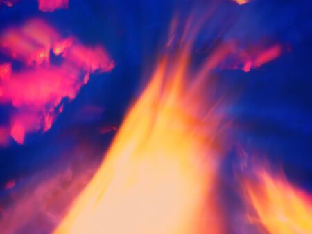 blurred background, flames of fire smoldering in the background...