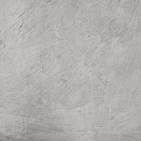 Rough white and gray cement wall of old plasterの写真素材