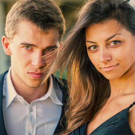 Portrait of a young couple outdoors, closeupの写真素材