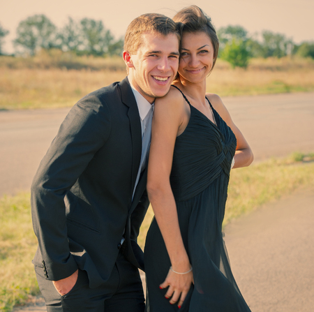 Portrait of a young couple flirting outdoorsの写真素材