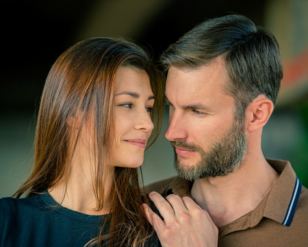 Flirting lovers for a walk in the parkの写真素材