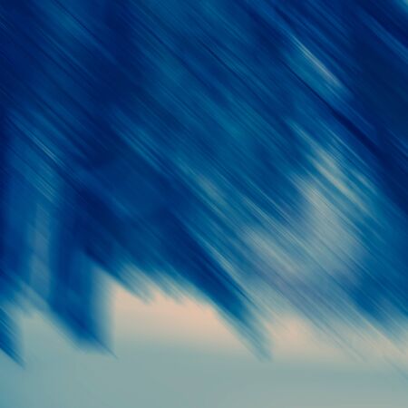 Abstract diagonal spots and lines in blue tonality, blurred background