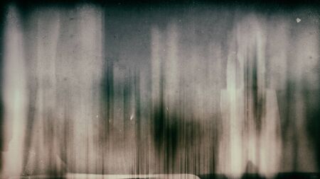 Grunge monochrome background, vintage dirty surface and scratches. The dark tonality.の写真素材