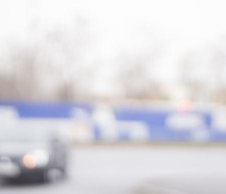 Cars are driving along the road.  Blurred light background. City. Urban.の写真素材