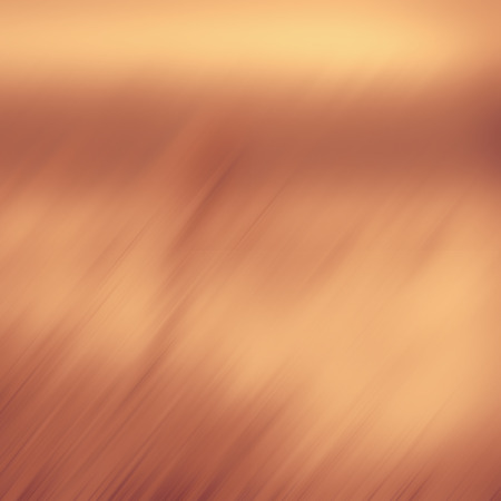 Abstract blurred yellow background. Diagonal orange colored lines and spots on the yellow. Design element.の写真素材