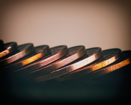 coins of euro cents stacked on the table. Coins on a blurred background. Currency of the European...