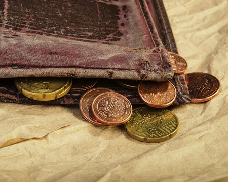 old wallet and euro coins cents. Euro money.  Currency of the European Union.