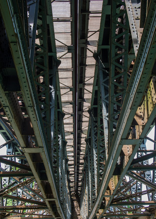 old metal bridge for railway transport and pedestrians in Basel, Switzerland. Europe.