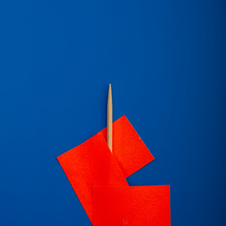 Wooden Toothpick is Pasted with Orange Markers on a Blue Background. Promotion, Marketing, SMM, CEO, Businessの写真素材