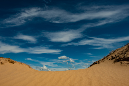 clouds and sand dunes. Summer landscape in the countryside.の写真素材