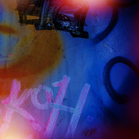 fragments of graffiti and bright fragments of traces of paint. Traces of urbanization.の写真素材