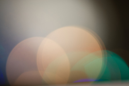 festive light illumination and light spots on a dark pastel background. Blurred background. Web design.の写真素材