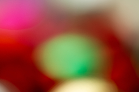 holiday lighting effects of different colors and spots on a light background. Blurred background. Web design.の写真素材