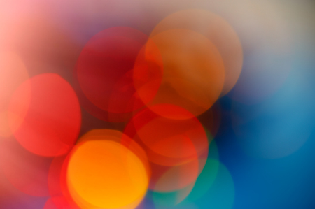abstract defocused spots Christmas lighting. Blurred color background. For design.