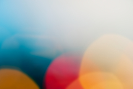 abstract defocused spots Christmas lighting. Blurred color background. For design.の写真素材