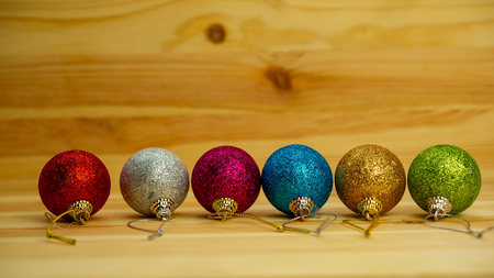 Christmas balls lie on a wooden surface. Web banner. New year concept.の写真素材