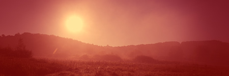Sunrise in the morning in a hilly area, meadow landscape countryside. Autumn season. Web banner for design.の写真素材