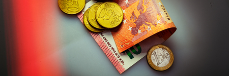 Paper notes and coins of euro and eurocents. The currency of the European Union. Web banner.の写真素材