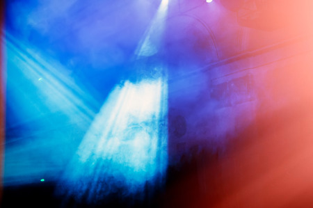 laser beams illuminate the scene in a haze during the performance. Banner for design.の写真素材