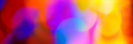 Abstract blurred background of red, orange, blue, pink, yellow spots. Web banner.