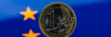 one euro coin on the background of the flag. Business concept. Web banner.のeditorial素材