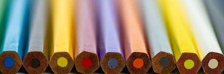 set of colored pencils on a light background, close-up. Cover for design. Web banner.の写真素材