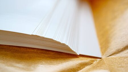 stack of white paper lies on waxed brown paper. For your design.の写真素材