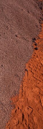 crushed iron ore in an industrial warehouse. Vertical Web Banner.の写真素材