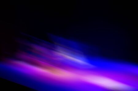 Abstract blurred color blurred dark background, purple, cyan, black and light spots. Web banner.