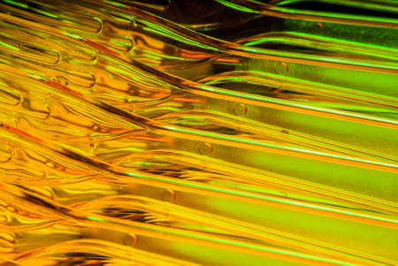 surface of plastic disposable forks.  Cooking food.
