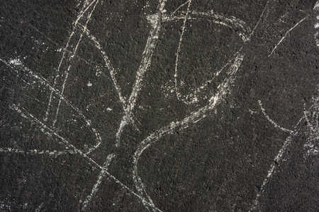 black and gray damaged cement wall plaster. Background for design.