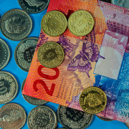 Centim coins and a twenty franc note. Business concept.の写真素材