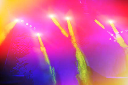 light rays on a dark background of the stage during a rock concert, blurred background. Web banner....