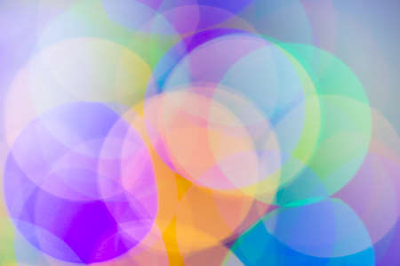 abstract blurred background, colored pastel bokeh spots on light background. Festive background. Web banner.の写真素材
