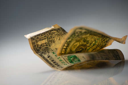 Crumpled paper one US dollar bill, close-up. Business concept. Web banner.