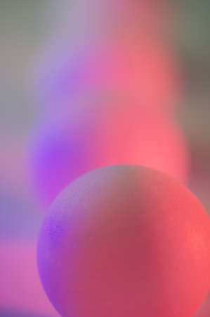 Abstract background, balls in pink and purple light. Background for design. Cover.