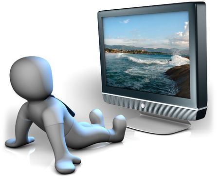 A man watching a big TVの写真素材