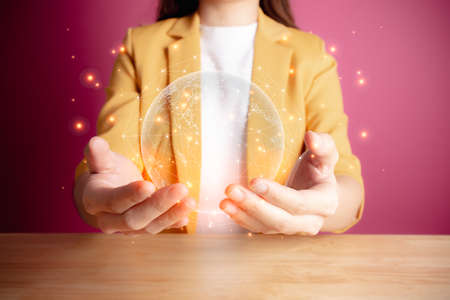 Businesswoman holding Global network connection. Big data analytics and business intelligence...