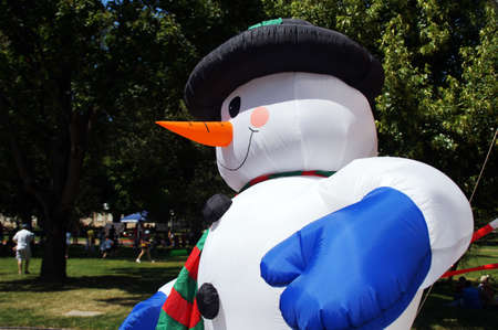 A snowman in summer  An inflatable snowman posing in front of the theater in Stuttgart  の写真素材