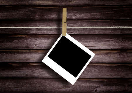Old Film Blanks Hanging on a Rope Held By Clothespins
Historical photo concept.