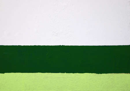 detail of painted bands on a column in a parking lotの写真素材