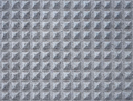 detail of a cement tile floor shaped to prevent slippage