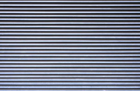 detail of a metal grille for ventilation of electronic or heating devices