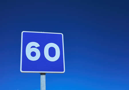 detail of a recommended speed sign at 60 km / h mphの写真素材