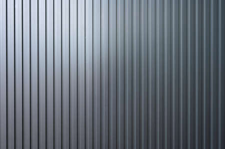 detail of a wall formed by a formed metal panelの写真素材