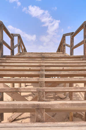 detail of a stairway to the beach between the dunesの写真素材