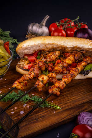 Appetizer chicken kebab sandwich with vegetablesの写真素材