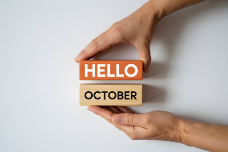 "Hello October" Visual Concept on Wooden Blocks for Business or Media. Minimalist Wooden Blocks Composition.の素材