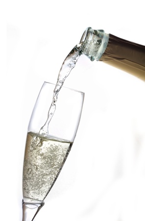 pour champagne from bottle into glassの写真素材